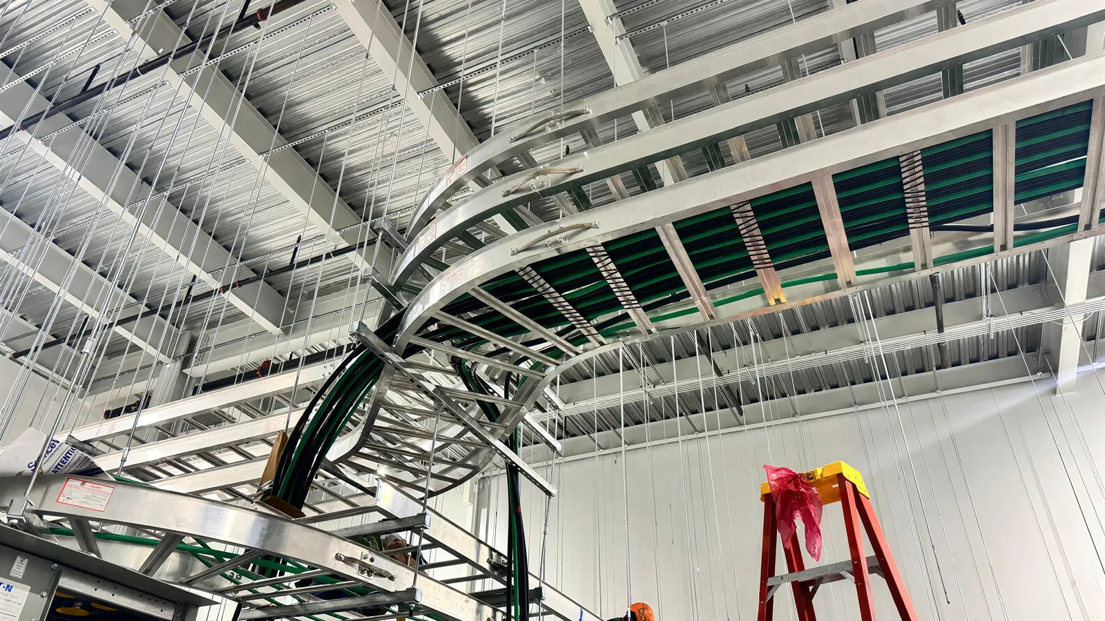 Cable tray and conduit turning out of a switchgear room